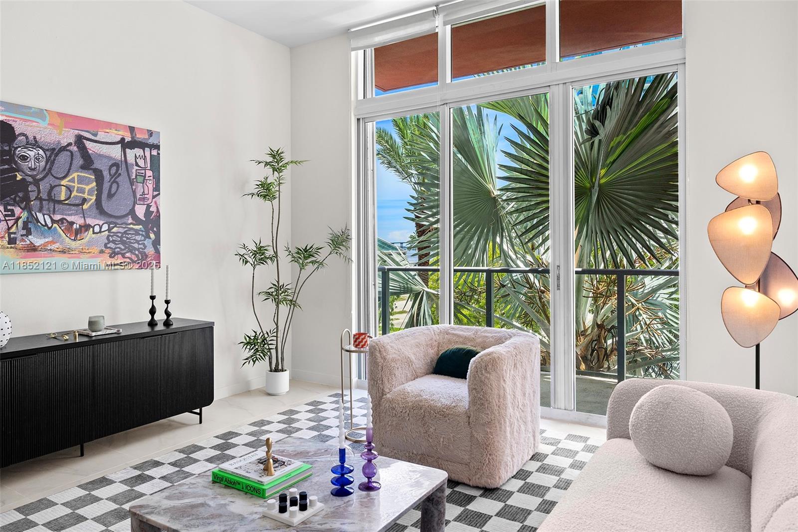 1155 Brickell Bay Drive, Unit 203 Miami, FL 33131 - Photo 21 of 36 a living room with furniture