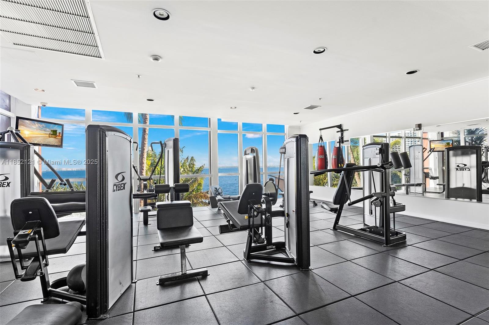 1155 Brickell Bay Drive, Unit 203 Miami, FL 33131 - Photo 25 of 36 a view of a room with gym equipment