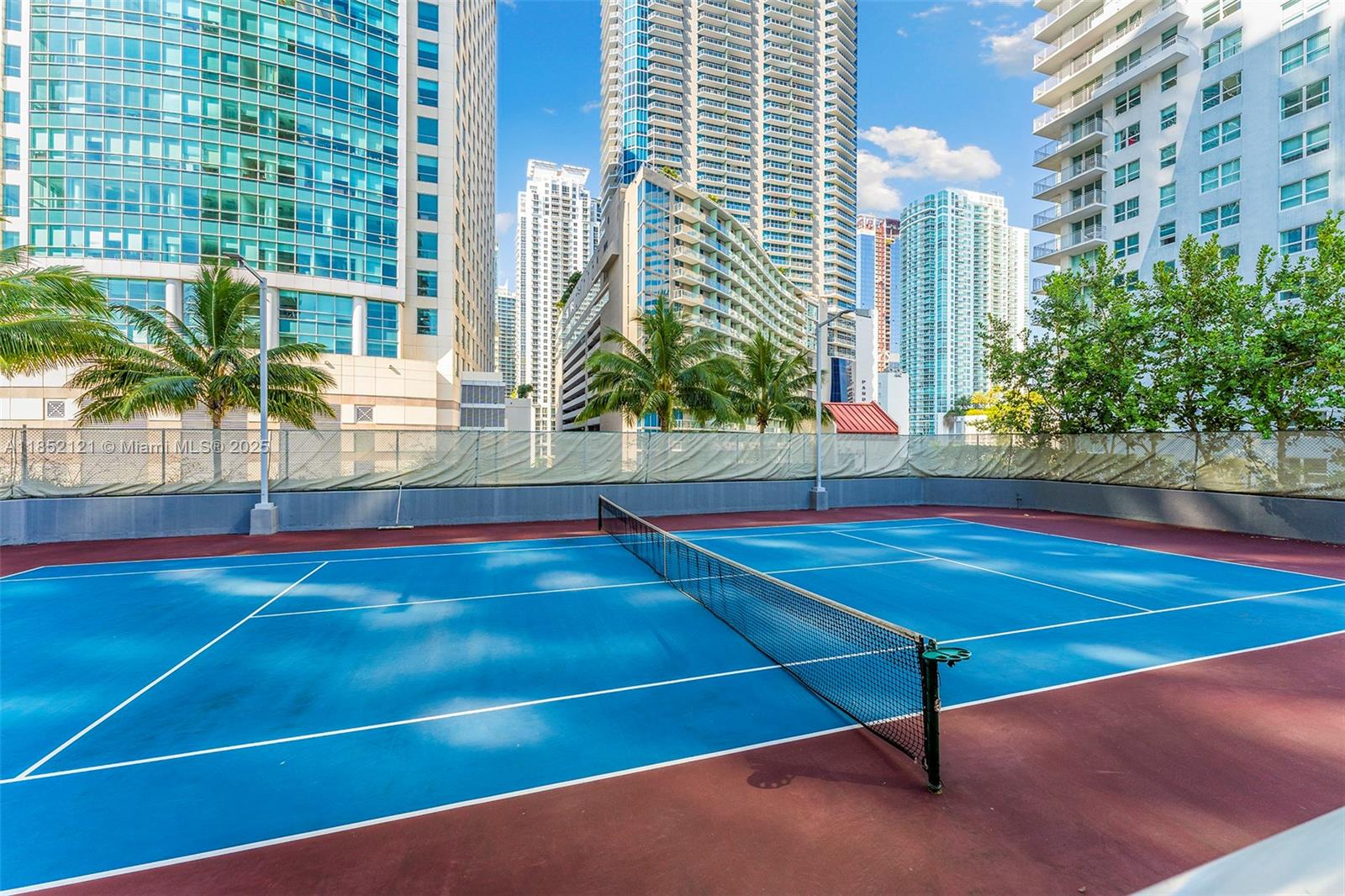 1155 Brickell Bay Drive, Unit 203 Miami, FL 33131 - Photo 28 of 36 a view of an outdoor space with pool and sitting space