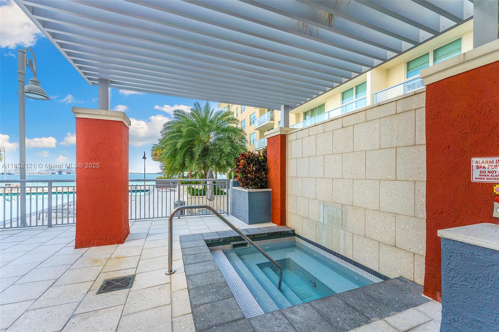 1155 Brickell Bay Drive, Unit 203 Miami, FL 33131 - Photo 29 of 36 a view of backyard with cabin