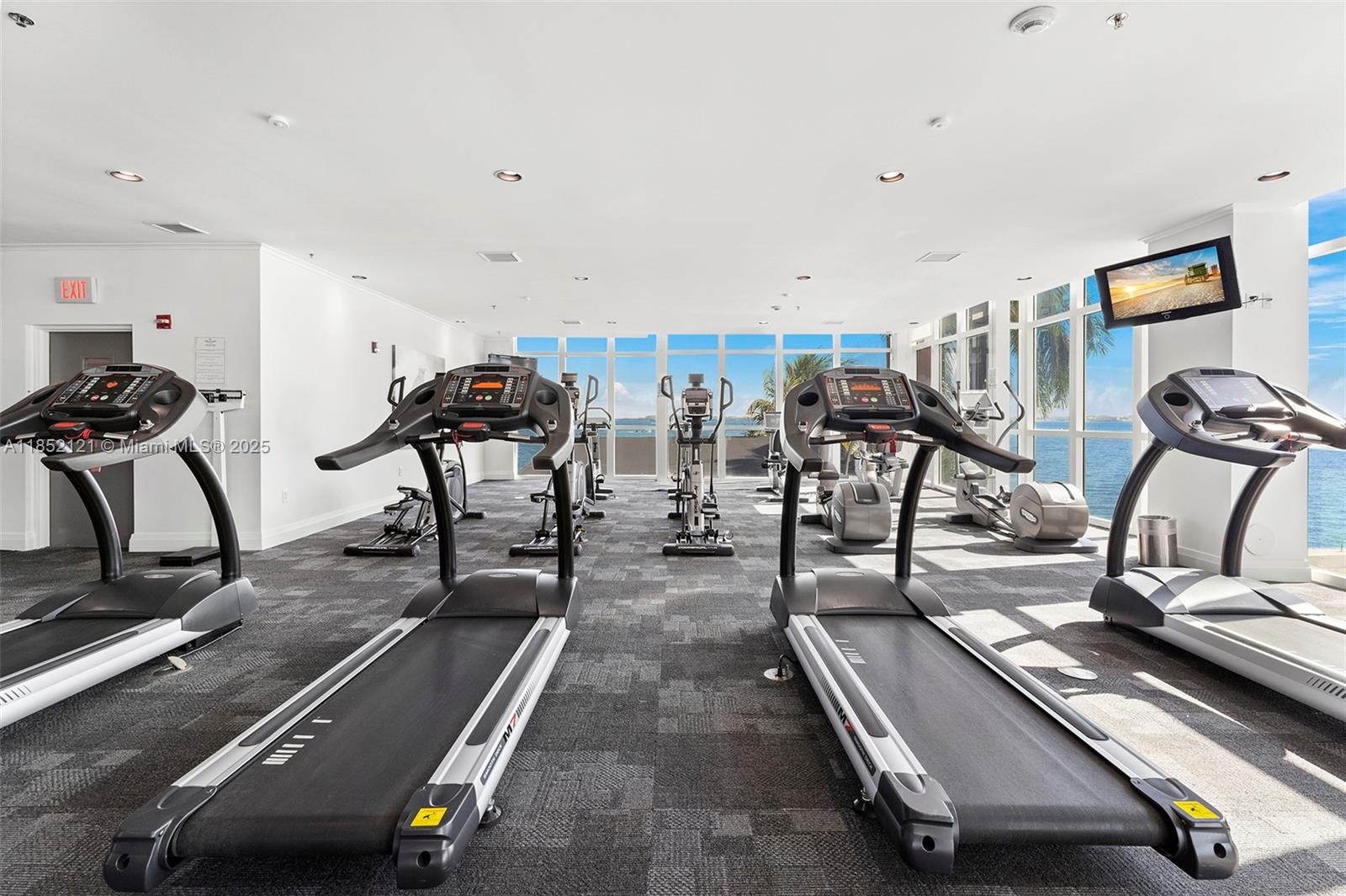1155 Brickell Bay Drive, Unit 203 Miami, FL 33131 - Photo 35 of 36 a view of a room with gym equipment