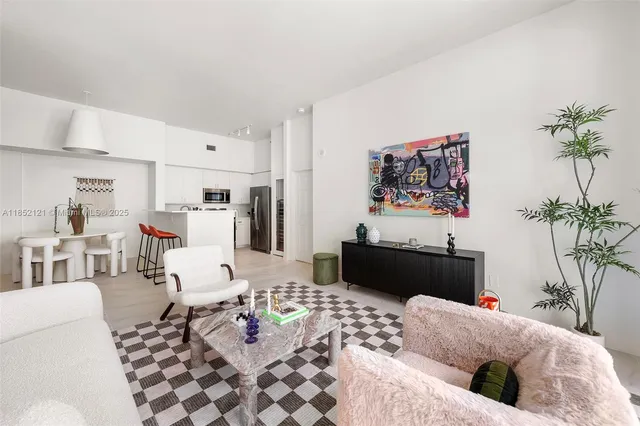 a living room with furniture and a couch