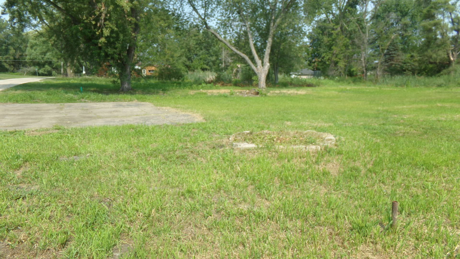 a view of outdoor space with deck and yard
