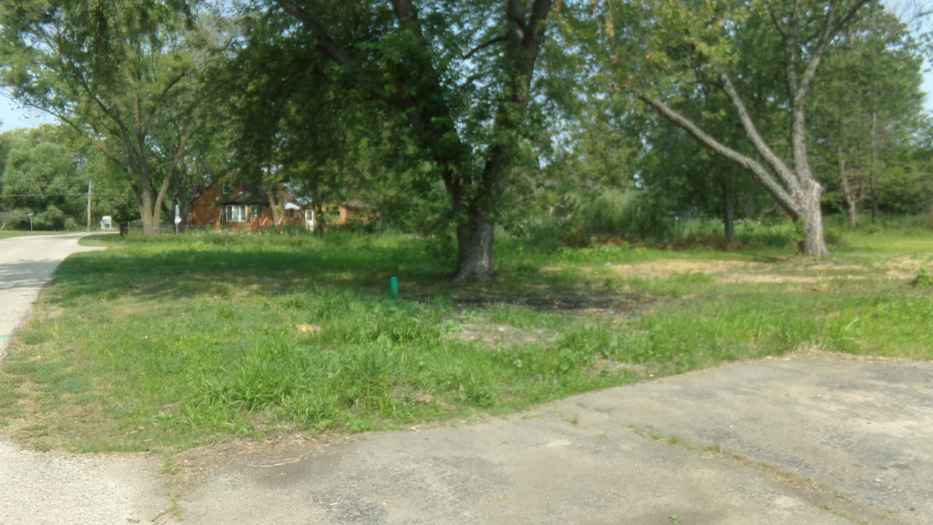 300 Knollwood Road Ingleside, IL 60041 - Photo 4 of 4 a view of outdoor space with green field and trees