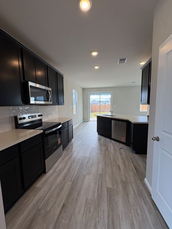 112 Elm Br Trail Taylor, TX 76574 - Photo 4 of 23 Beautiful details in Open Concept Kitchen