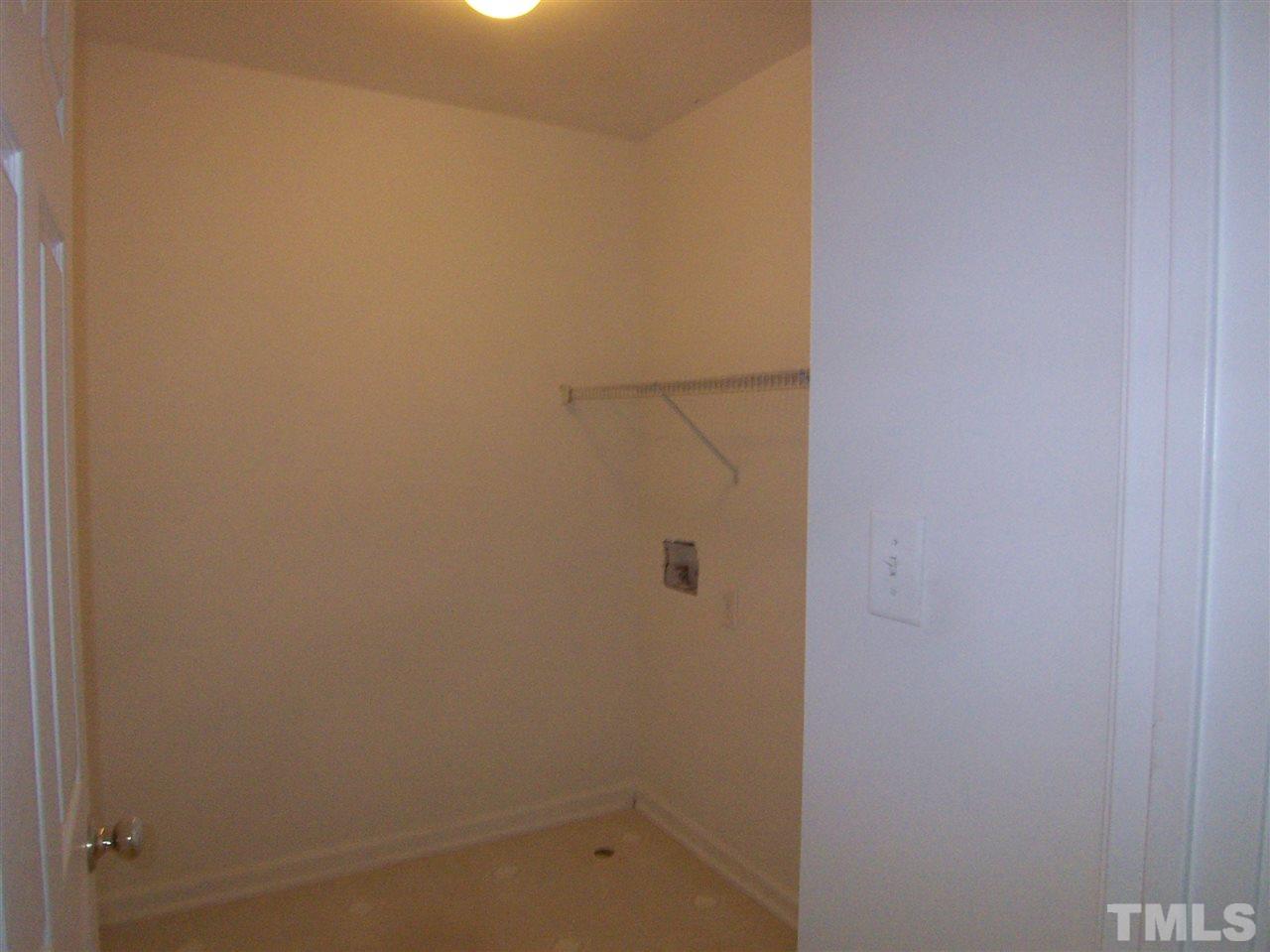 3904 Tyler Bluff Lane Raleigh, NC 27616 - Photo 8 of 13 a bathroom with a shower