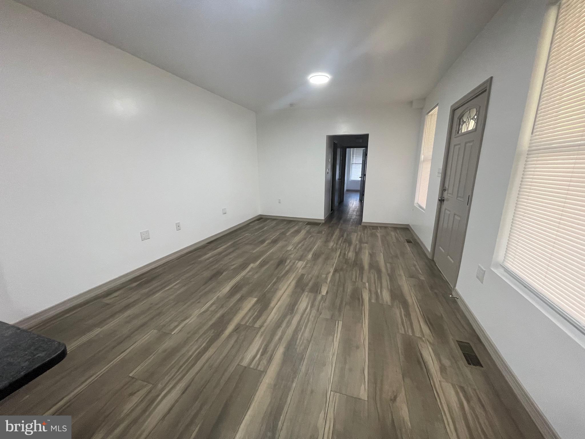 20 Pennsylvania Avenue, Unit 1 Reading, PA 19605 - Photo 6 of 17 a view of wooden floor in a room