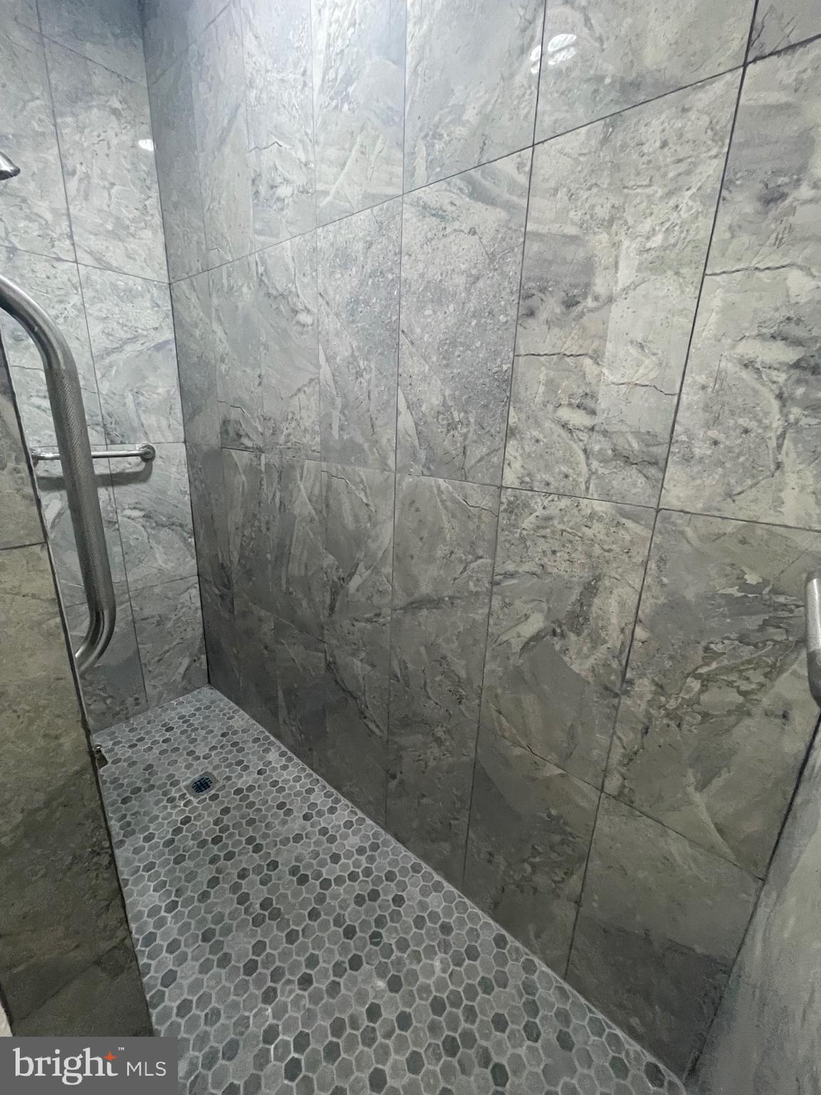 20 Pennsylvania Avenue, Unit 1 Reading, PA 19605 - Photo 9 of 17 a bathroom with a shower