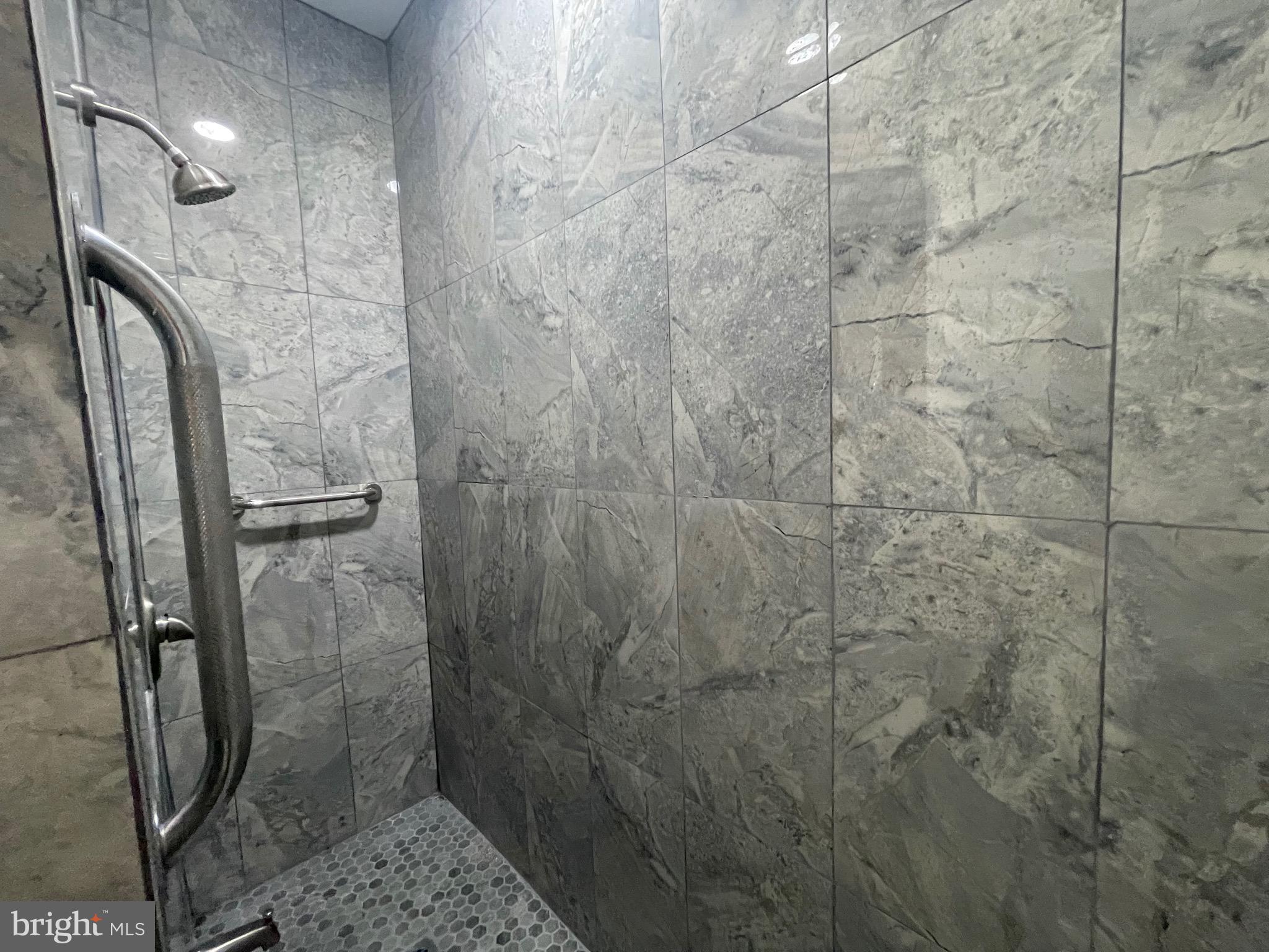 20 Pennsylvania Avenue, Unit 1 Reading, PA 19605 - Photo 10 of 17 a bathroom with a shower