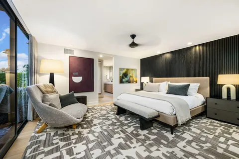 a bed room with bed and a couch