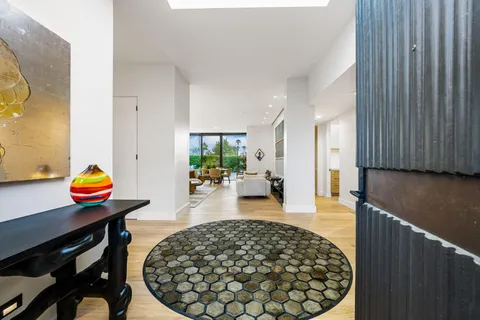 a view of a living room and dining room