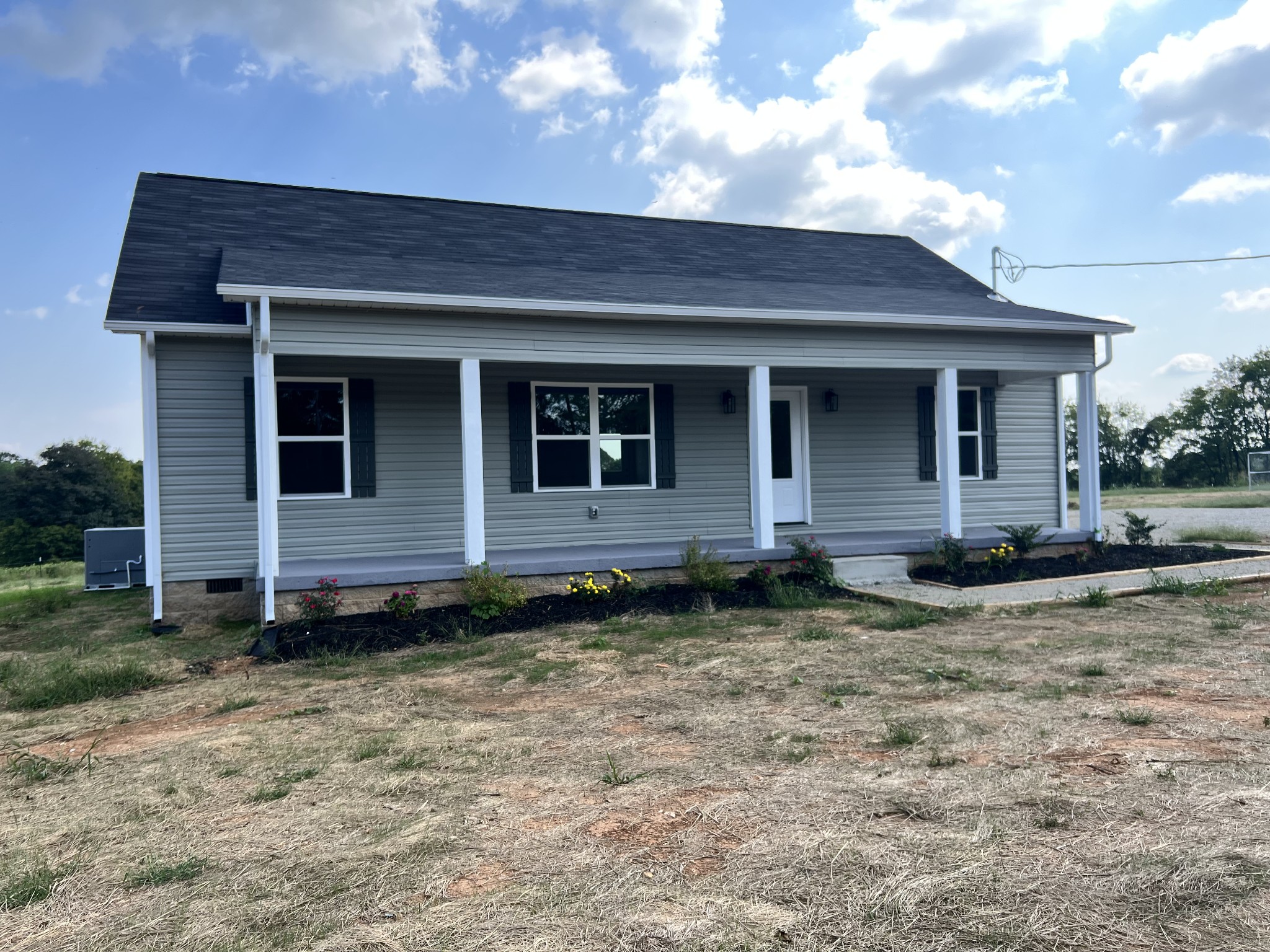 5712 Little Dry Creek Road Pulaski, TN 38478 - Photo 1 of 34 a view of front of a house with a yard