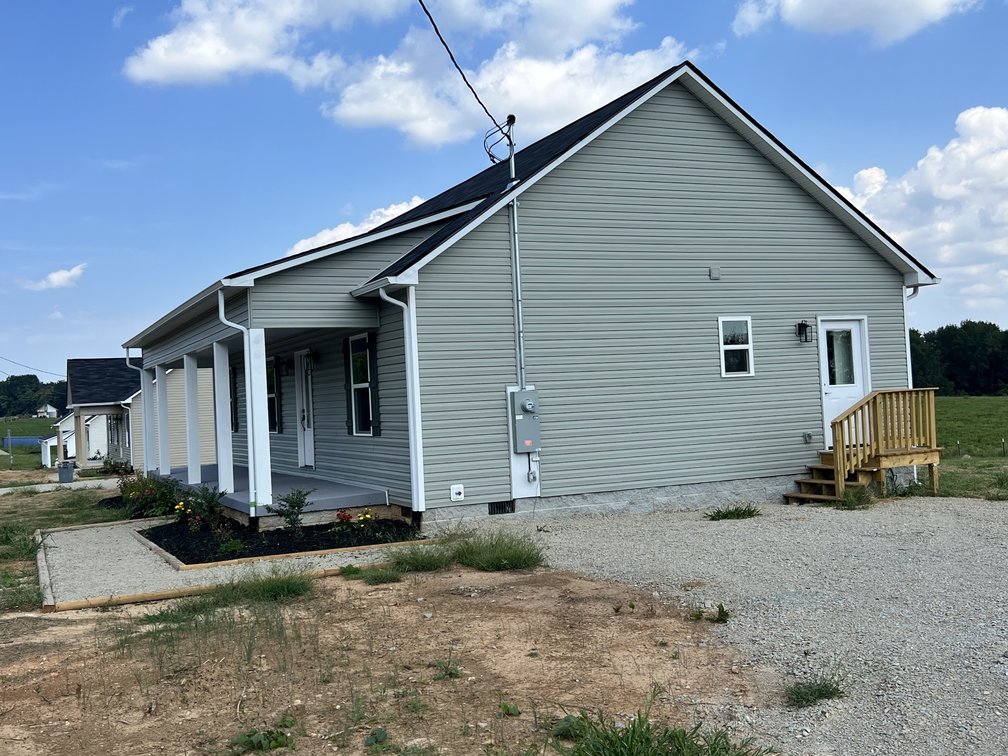 5712 Little Dry Creek Road Pulaski, TN 38478 - Photo 4 of 34 a view of a house with a yard