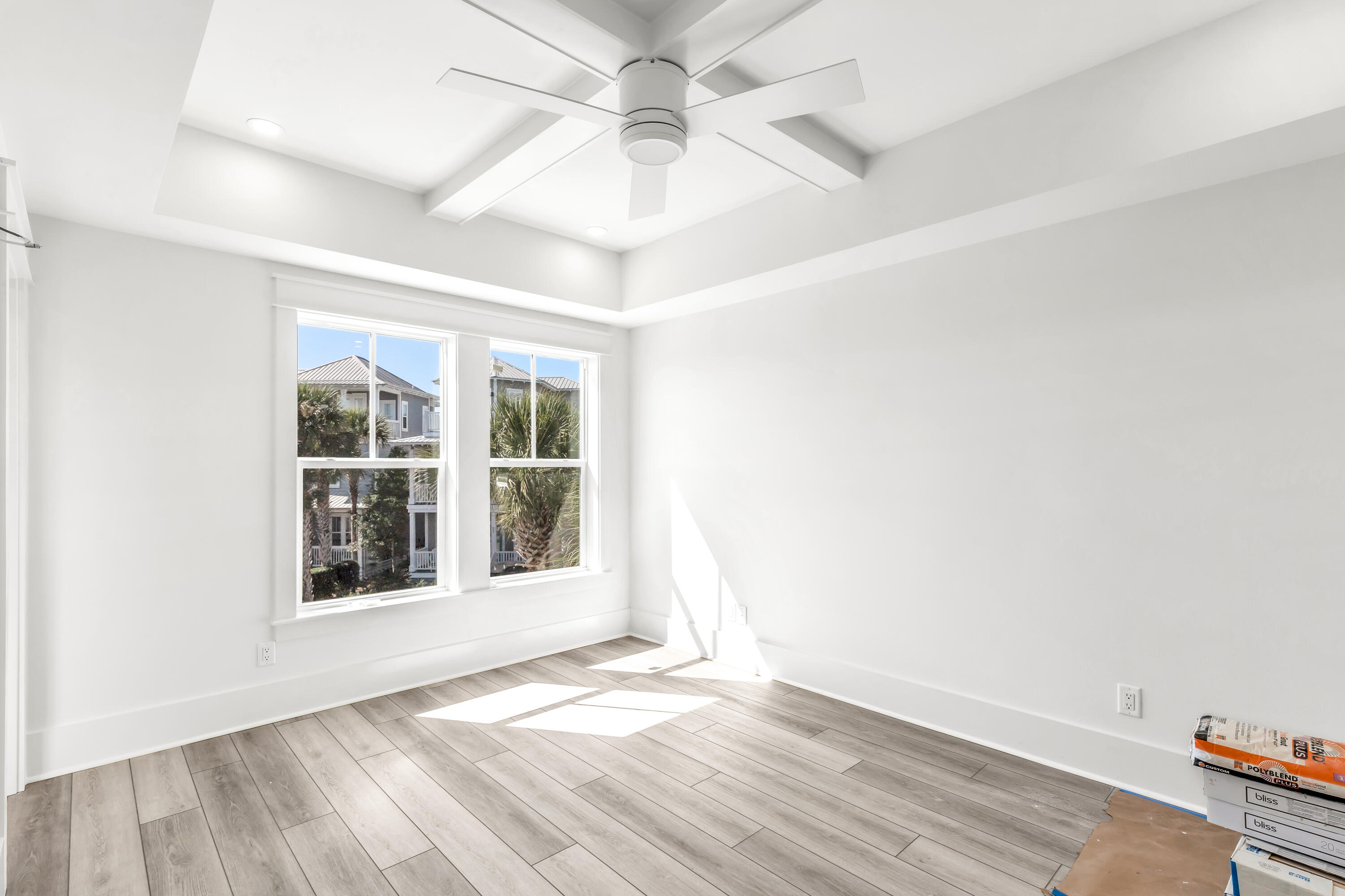 163 Beach Bike Way Inlet Beach Inlet Beach, FL 32461 - Photo 14 of 32 an empty room with wooden floor and windows