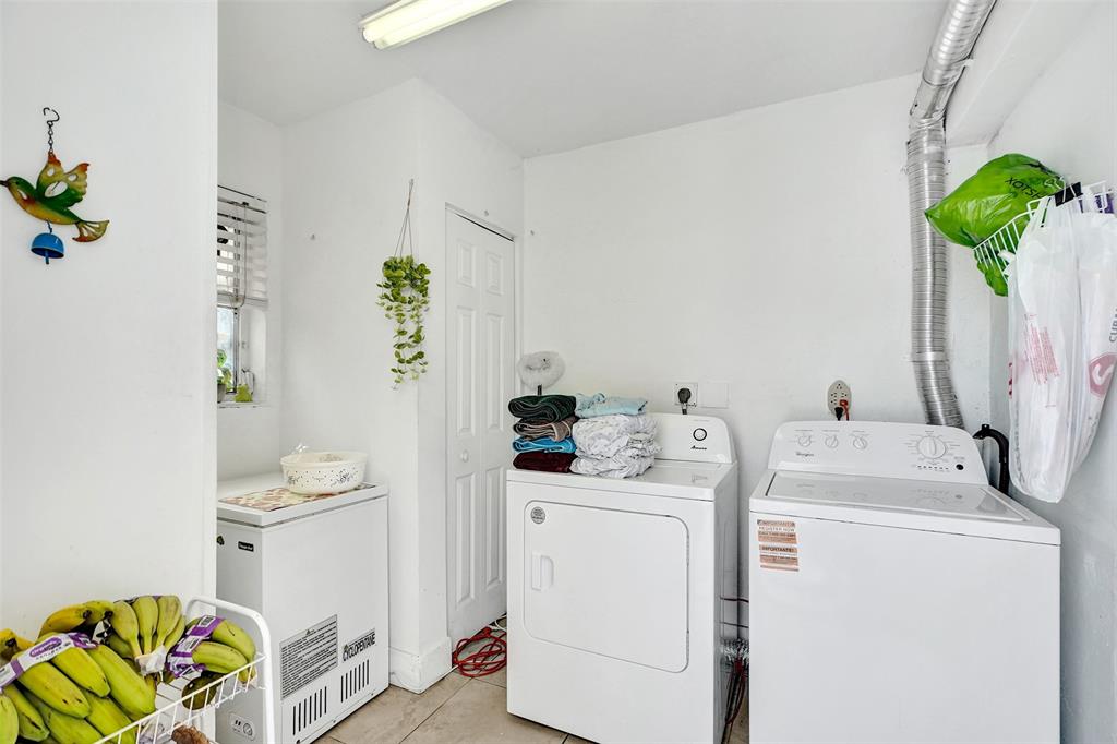 1732 West 72nd Street, Unit 1732 Hialeah, FL 33014 - Photo 18 of 58 a utility room with dryer and washer