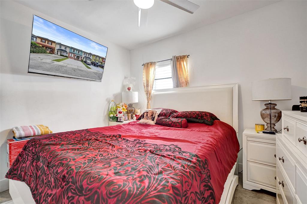 1732 West 72nd Street, Unit 1732 Hialeah, FL 33014 - Photo 22 of 58 a bedroom with a bed and closet