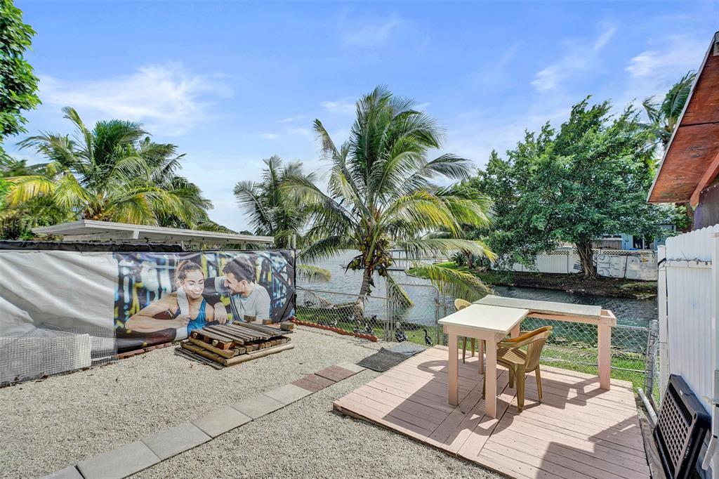 1732 West 72nd Street, Unit 1732 Hialeah, FL 33014 - Photo 42 of 58 a view of a backyard with sitting area