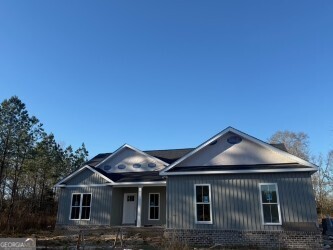 4381 Nessmith Road Statesboro, GA 30458 - Photo 1 of 11 a front view of a house with yard
