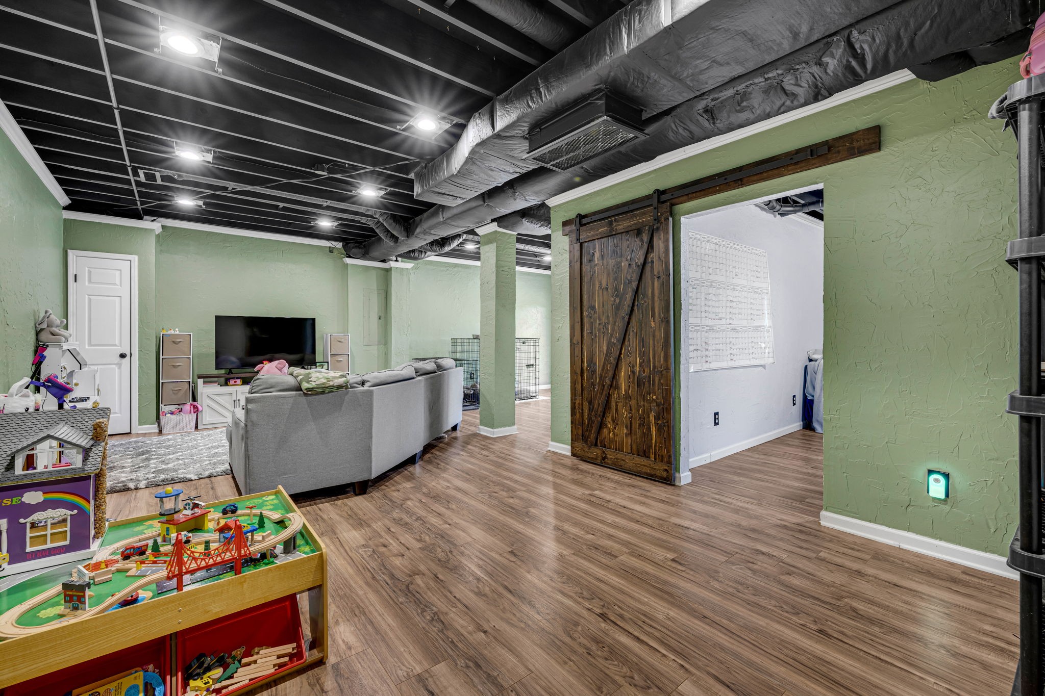 2188 Hicks Lane Columbia, TN 38401 - Photo 33 of 61 a view of an empty room with wooden floor and furniture