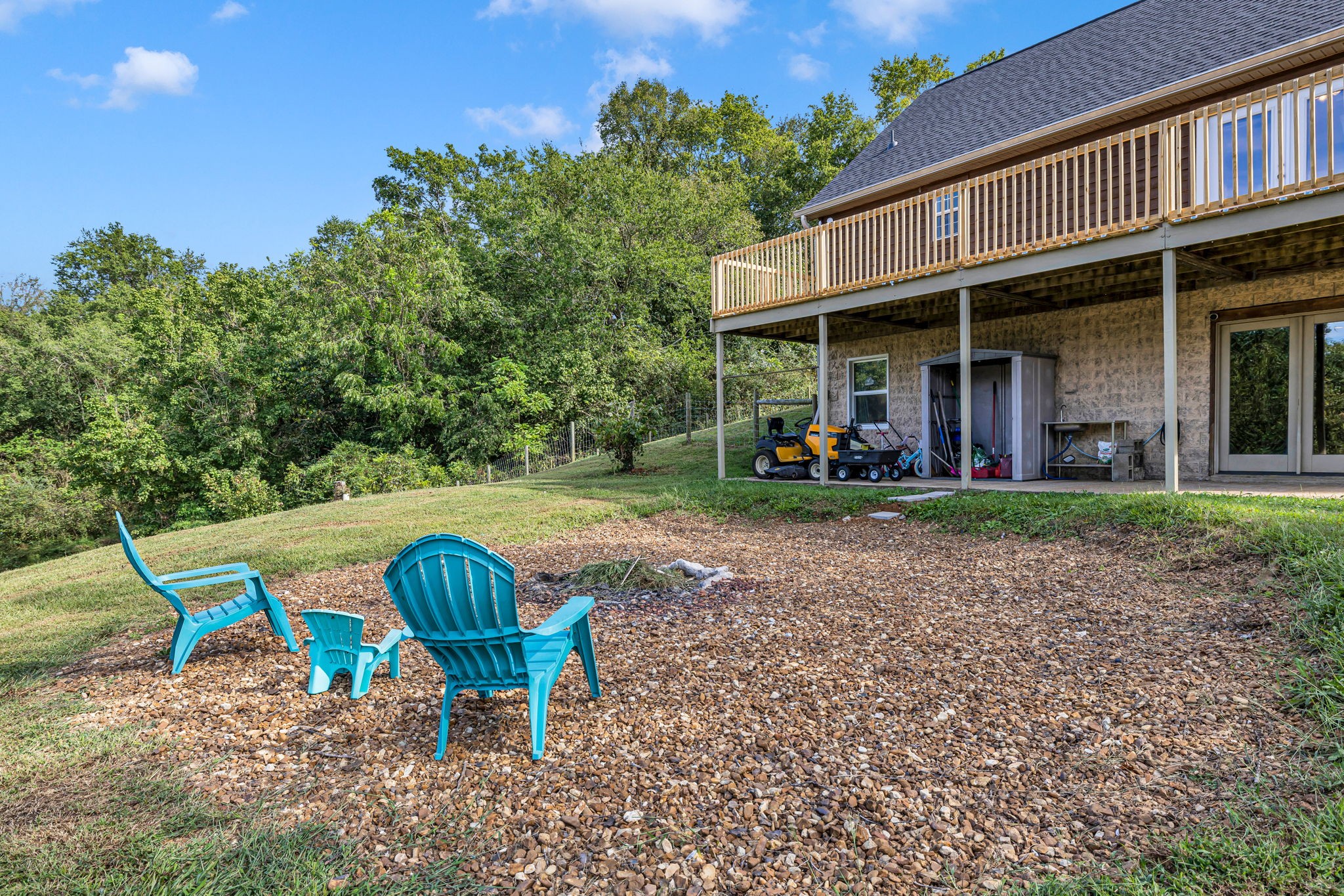 2188 Hicks Lane Columbia, TN 38401 - Photo 37 of 61 a view of a house with a yard potted plants and a bench