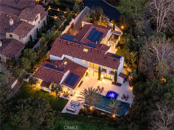 an aerial view of house with yard