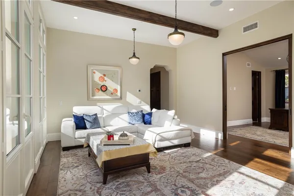 a living room with furniture and a rug