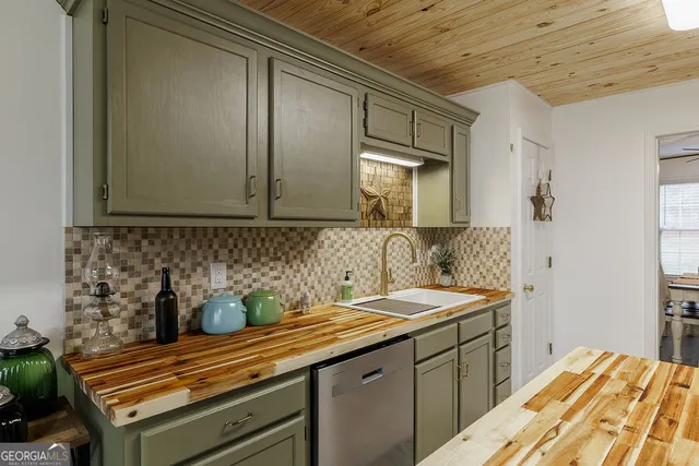 a kitchen with a stove microwave and refrigerator