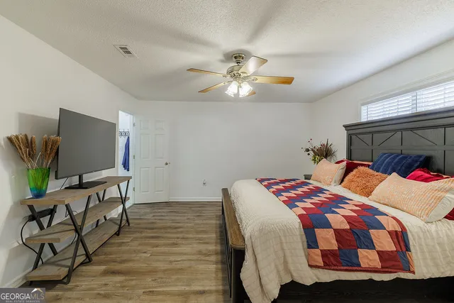 a living room with a couch and a table