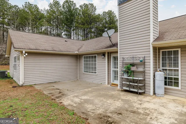 a house view with a garden space