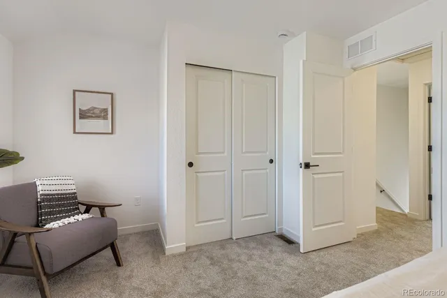 a room with furniture and a window