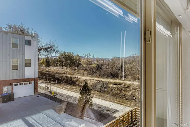 a view of balcony with furniture