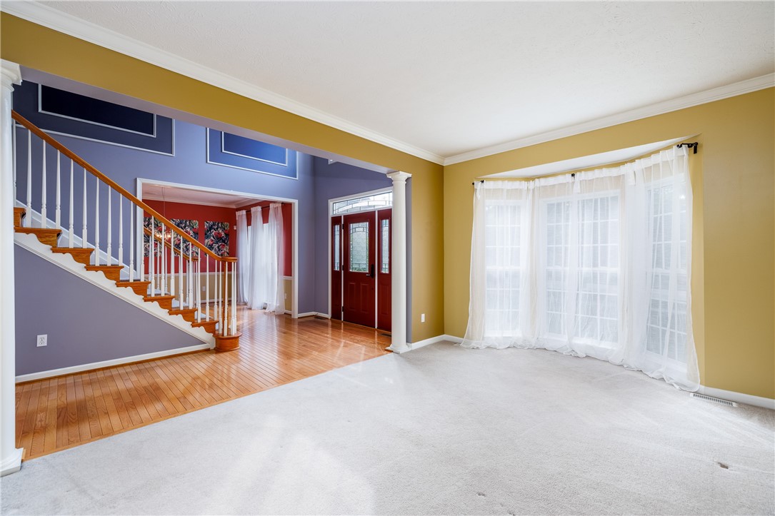 2 Hamilton Road Perinton, NY 14450 - Photo 19 of 39 Living room with view of foyer & staircase 1