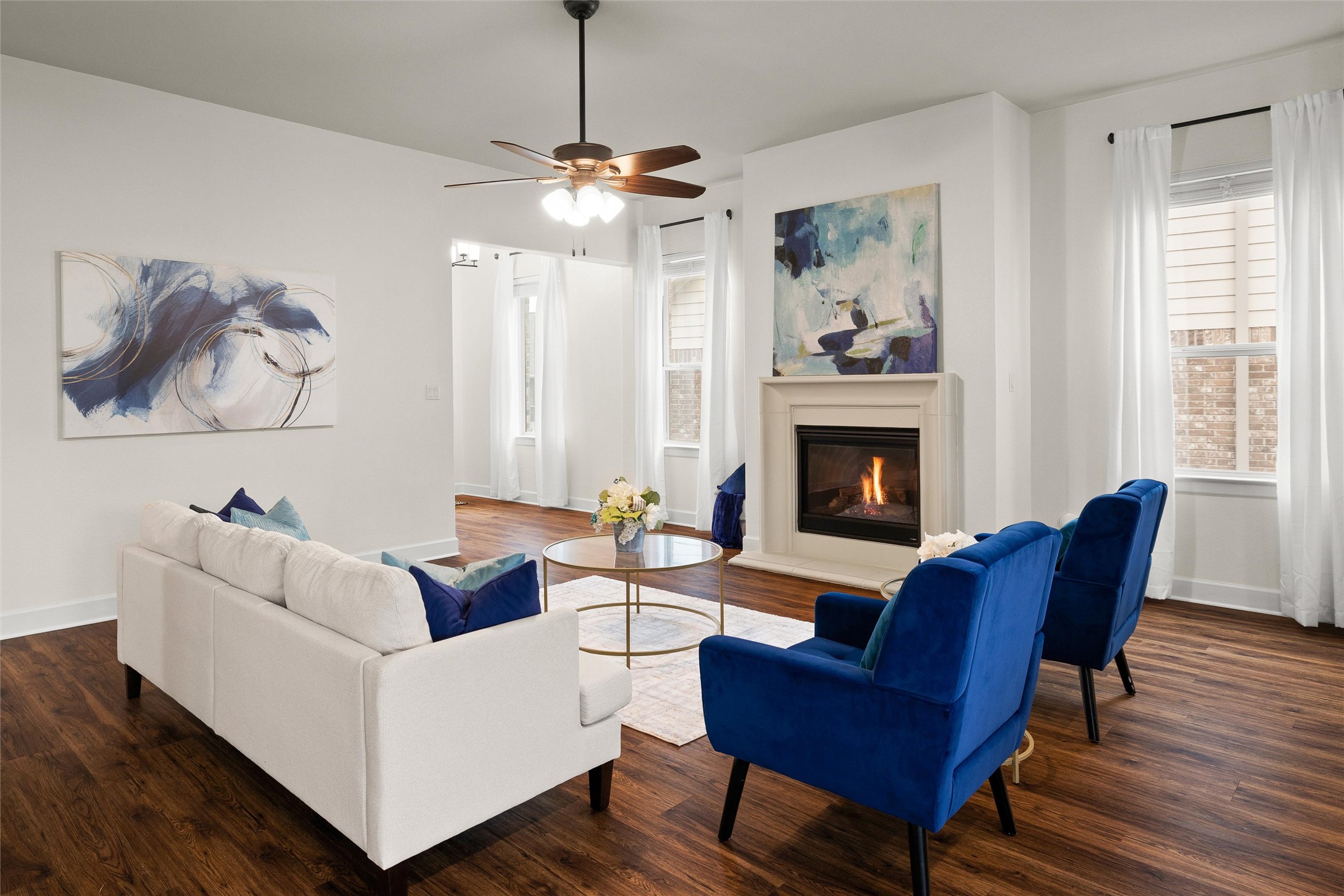 143 Bright Vly Way Austin, TX 78737 - Photo 11 of 34 a living room with furniture and a fireplace
