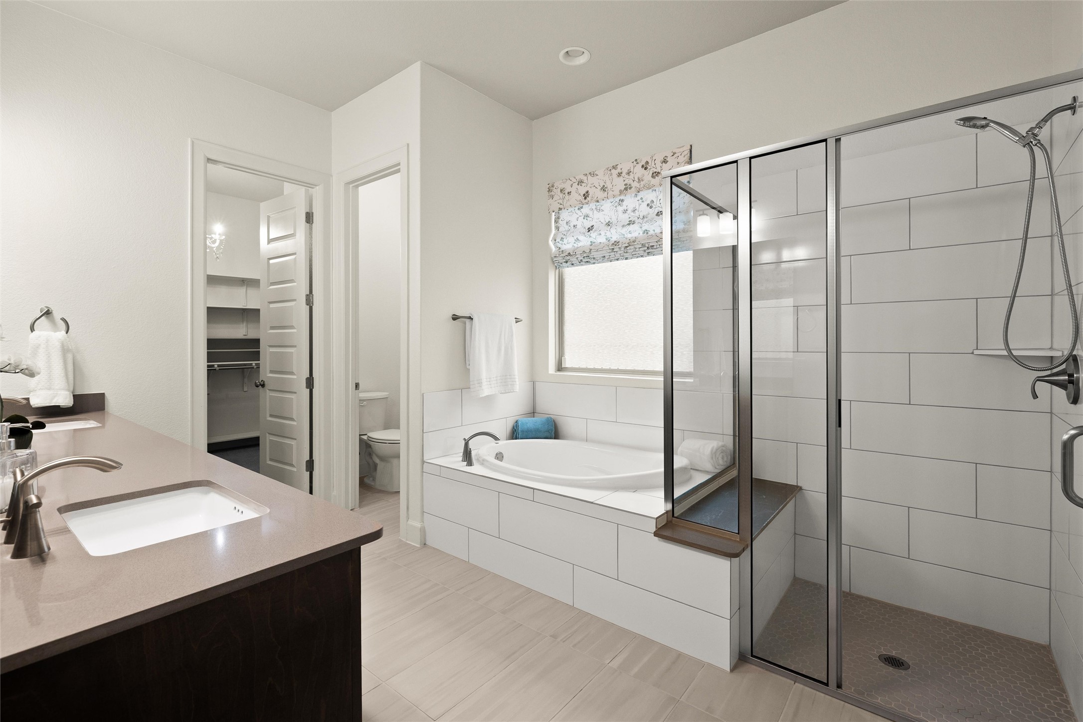 143 Bright Vly Way Austin, TX 78737 - Photo 22 of 34 a bathroom with a bathtub and a sink