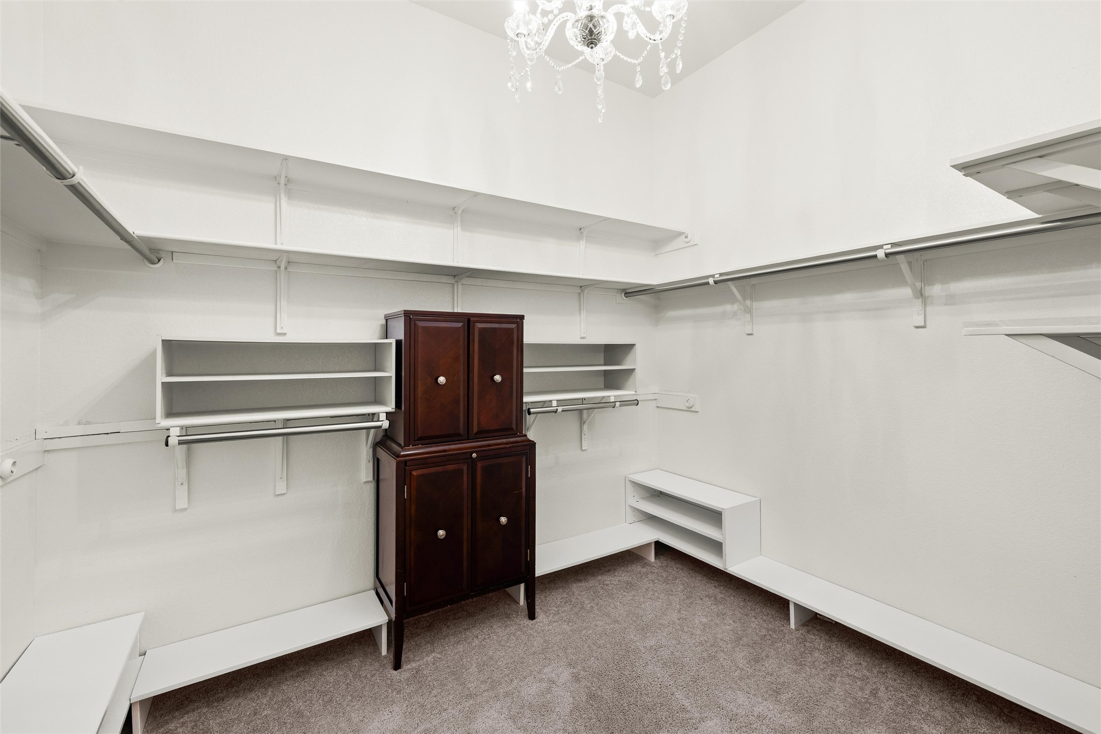 143 Bright Vly Way Austin, TX 78737 - Photo 24 of 34 a storage room with cabinets