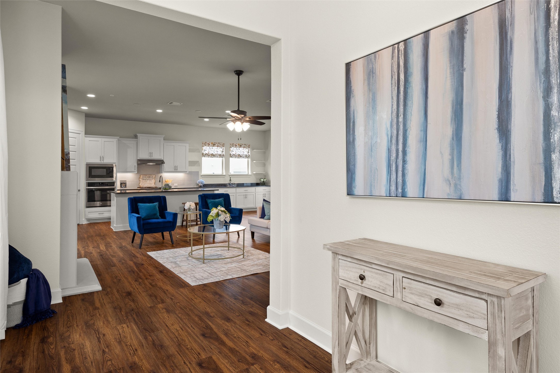 143 Bright Vly Way Austin, TX 78737 - Photo 8 of 34 a living room with stainless steel appliances kitchen island granite countertop furniture and a kitchen view