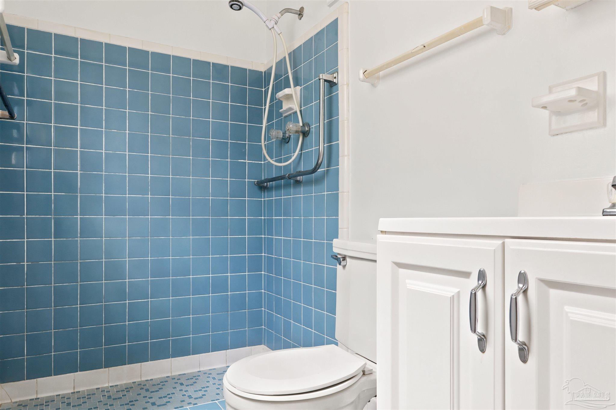 101 Vanderbilt Road Pensacola, FL 32506 - Photo 20 of 33 Primary bath, blue tile shower
