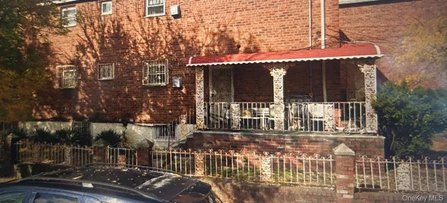 front view of a building with a glass windows