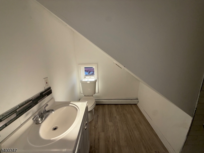 307 South Park Street Elizabeth Port, NJ 07206 - Photo 8 of 9 a bathroom with a sink and a mirror
