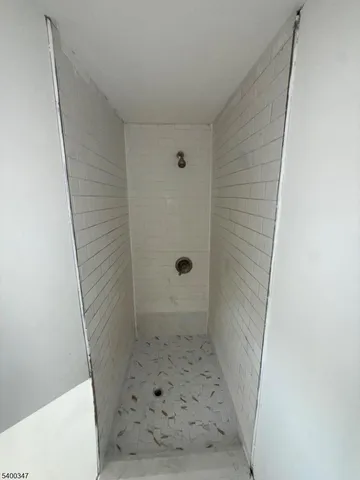 a bathroom with a sink and a shower