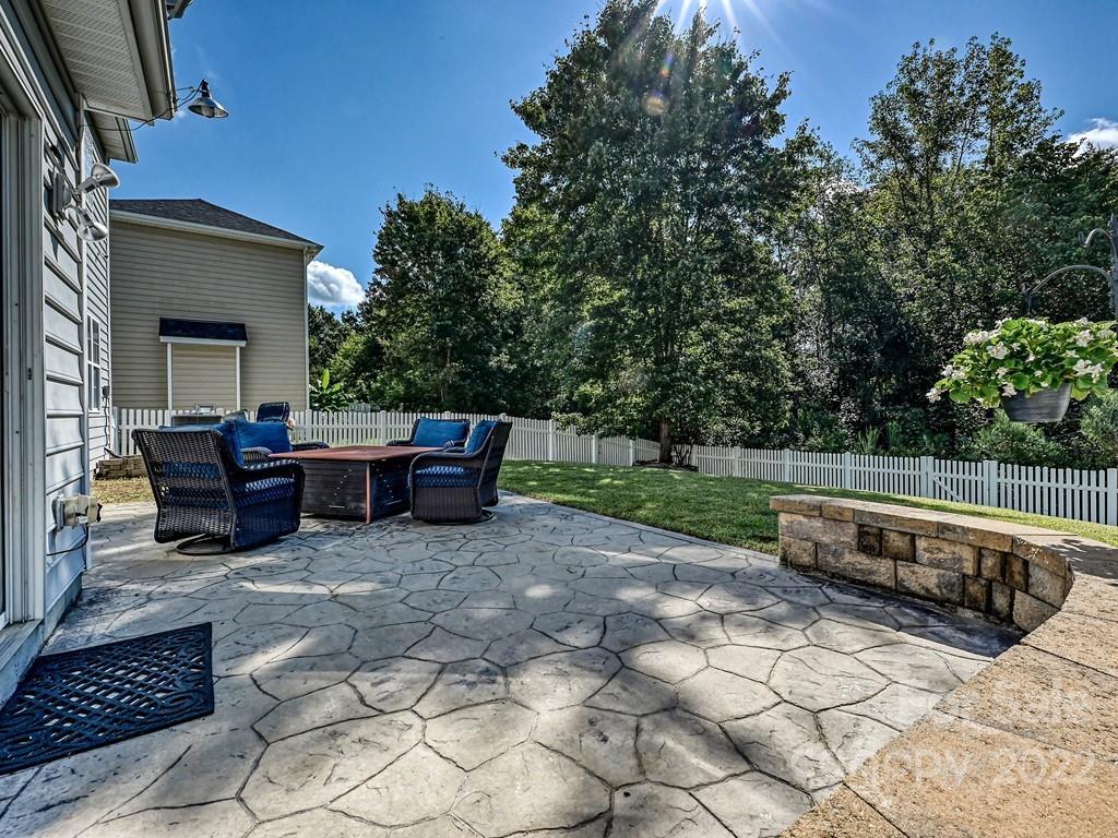 5811 Cactus Valley Road Charlotte, NC 28277 - Photo 31 of 36 a view of backyard with barbeque grill and outdoor seating