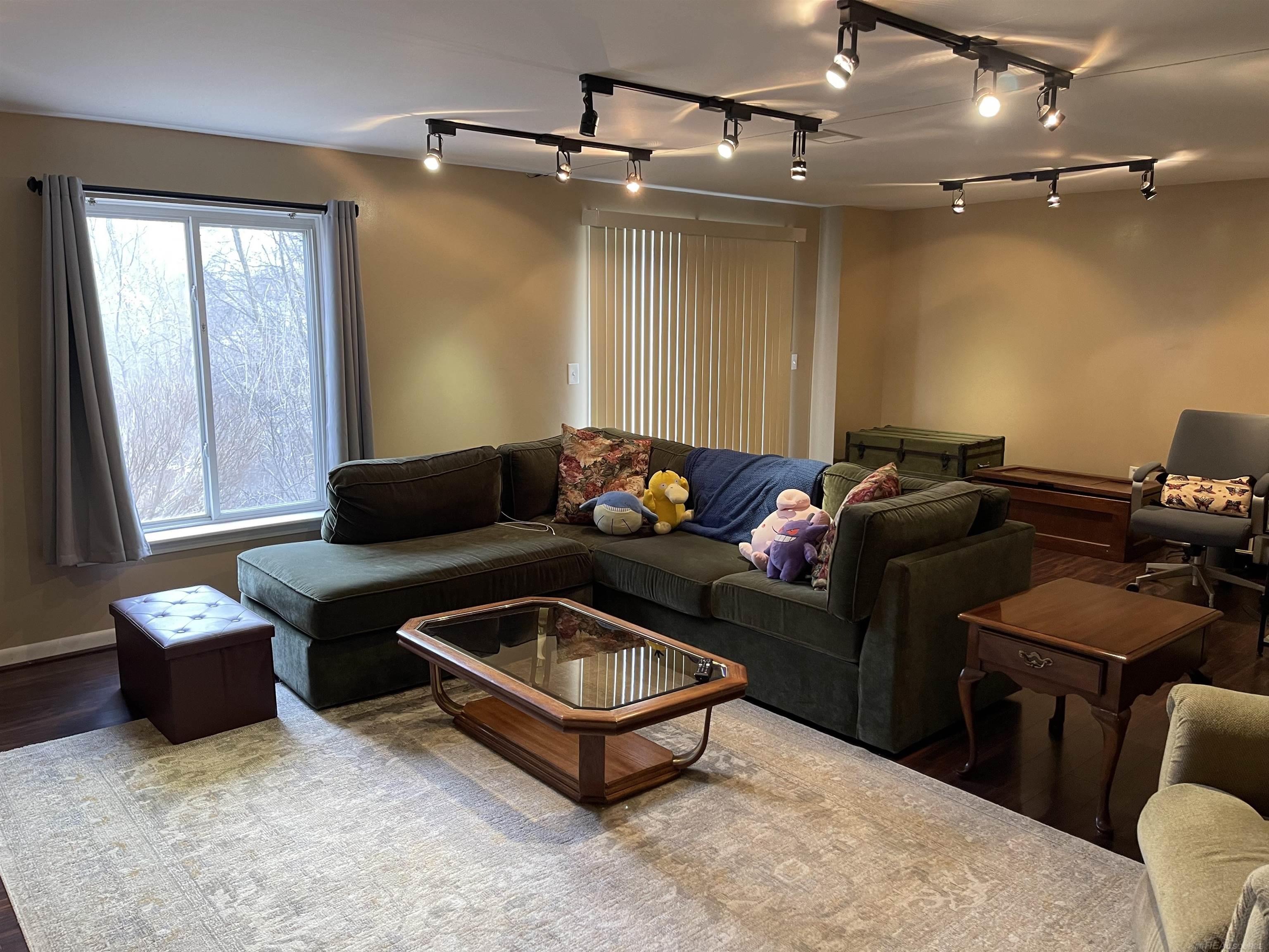 107 Eagle Ridge Road Lake Orion, MI 48360 - Photo 23 of 32 Lower Level Family Room