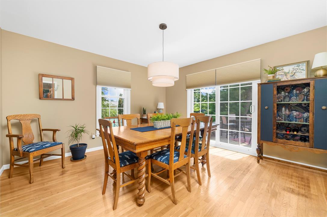 5616 Snowdrift Road Orefield, PA 18069 - Photo 8 of 36 Hardwood floors and generous natural light create an inviting dining space.