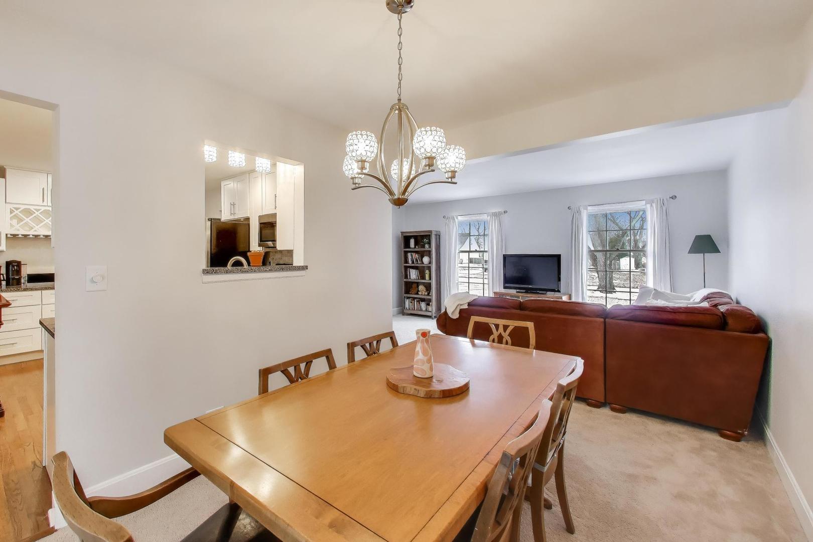 421 Berry Drive Naperville, IL 60540 - Photo 12 of 26 a view of a dining room with furniture