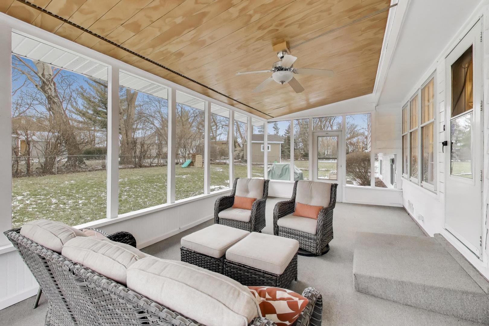 421 Berry Drive Naperville, IL 60540 - Photo 19 of 26 a living room with furniture and a large window