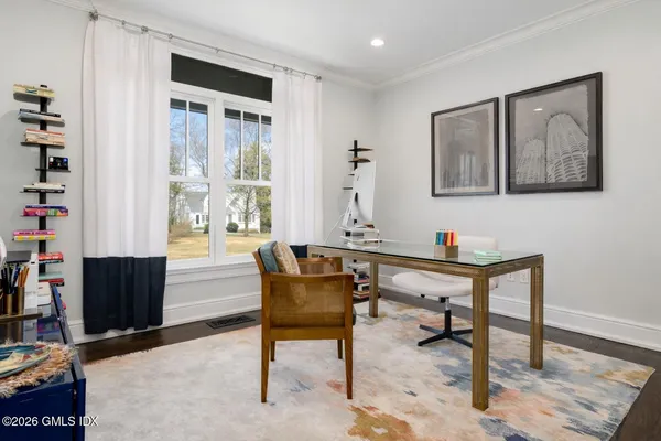 a view of a workspace with furniture