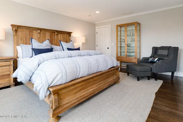 a bed room with a bed and a couch
