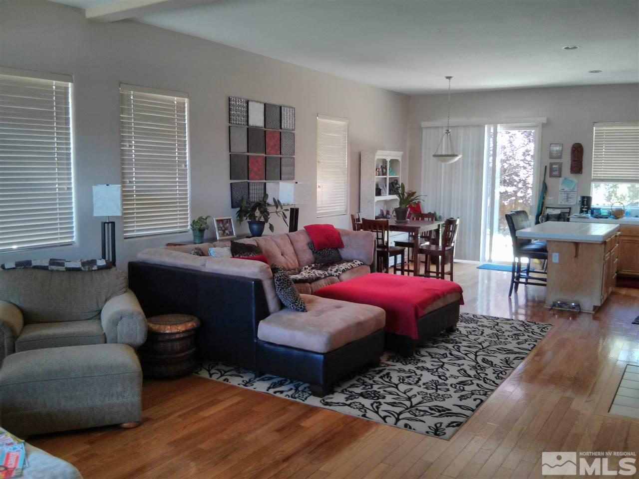 1641 Brentworth Way Reno, NV 89521 - Photo 4 of 11 a living room with furniture and wooden floor