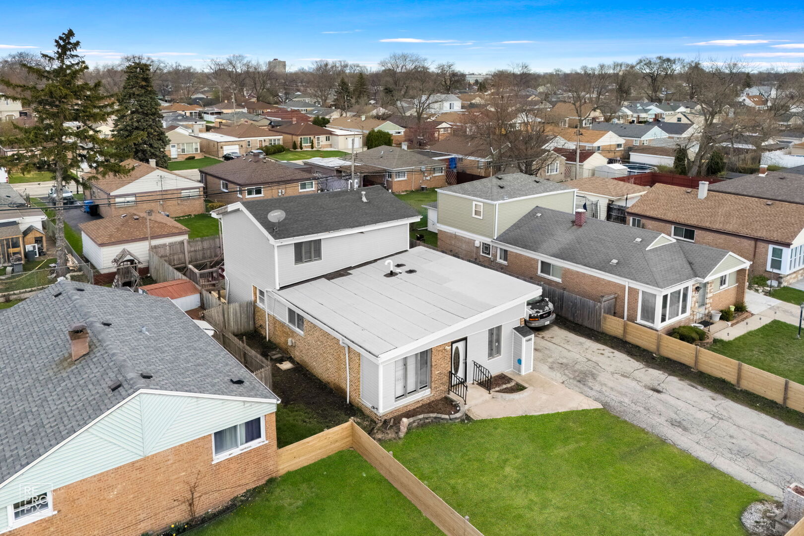 4680 West 83rd Street Chicago, IL 60652 - Photo 2 of 22 an aerial view of a house with a big yard