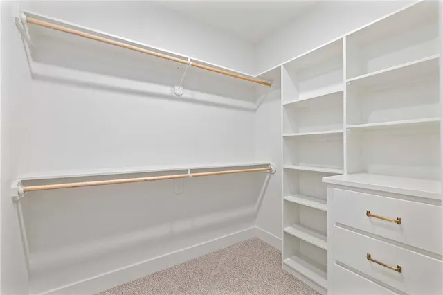 a view of an empty walk in closet